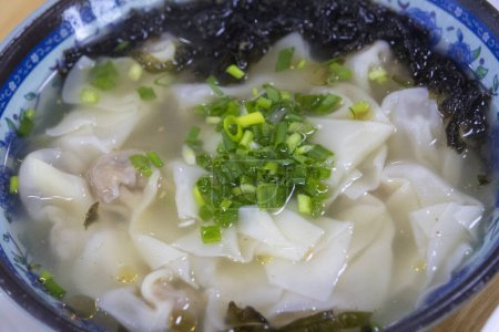Photo for Traditional Chinese wonton soup with stuffed meat - Royalty Free Image