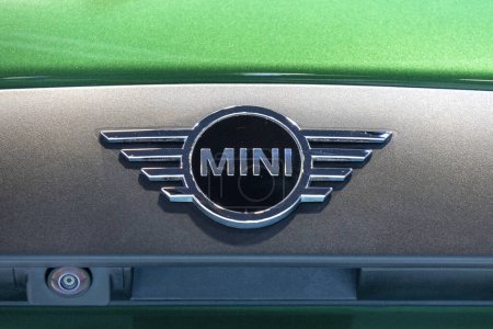 Photo for Singapore-12 Jan, 2024: MINI Cooper automobile dealership sign and logo. MINI Cooper is a brand of car made by BMW, - Royalty Free Image