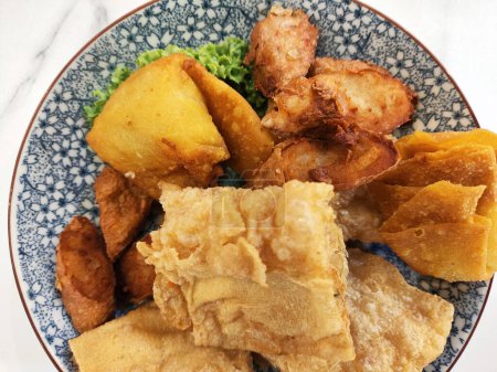 Variety of yong tau fu or stuffed tofu, popular Chinese food in Malaysia