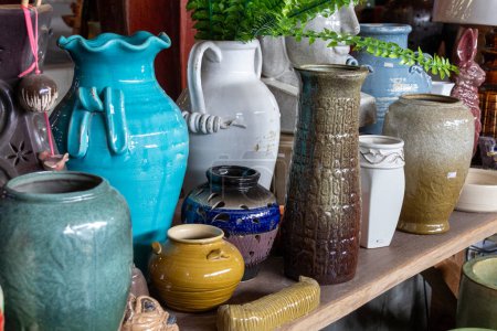 Photo for Many different pottery standing on the table for sale - Royalty Free Image