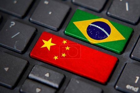 China and Brazil flags on computer keyboard. Relationship between two countries.