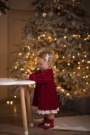 Photo for Little girl in christmas dress. My Real Holiday - Royalty Free Image