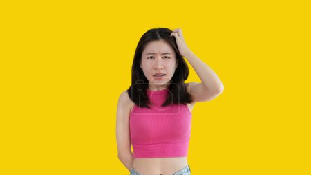 Woman is confused or numb with a question or subject that she doesn't understand, Have doubtsnumb, Woman doing dumbfounded expression isolated on white background, stupid, Silly.