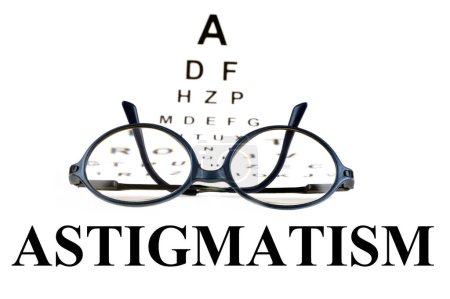 Téléchargez les photos : Astigmatism concept with blurred Monoyer eye chart and glasses - en image libre de droit