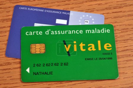 Photo for Vitale card and European health insurance card on a wooden background - Royalty Free Image