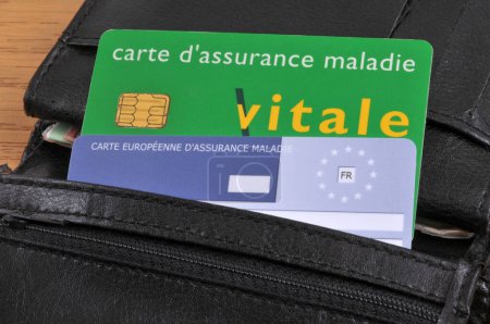 Photo for Vitale card and European health insurance card in a wallet close up - Royalty Free Image