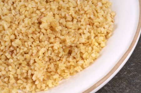 Plate of cooked bulgur close-up