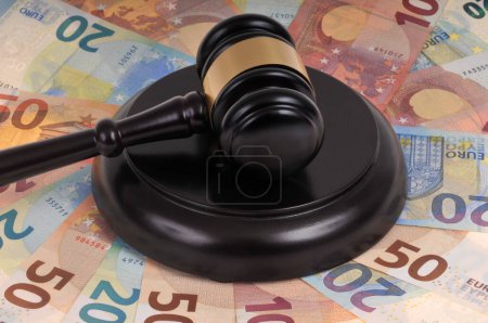 Judge gavel on a background of euro banknotes