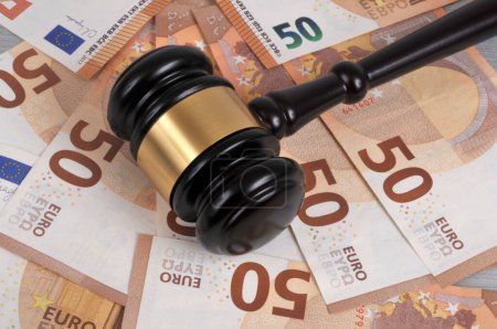 Close-up judge gavel placed on euro banknotes