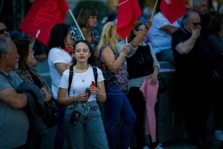 Photo for PORTO, PORTUGAL - MAY 1, 2023: During celebration of May Day in the Porto historical centre. In Portugal, it was after the Carnation Revolution 1974, that the May Day was again freely commemorated. - Royalty Free Image