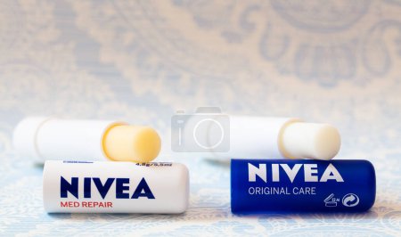 Photo for Beiersdorf, Germany - December 5, 2022: Nivea caring lip balm - Royalty Free Image