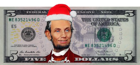 Téléchargez les photos : Abraham Lincoln à partir de billets de 5 dollars américains dans le chapeau du Père Noël à des fins de conception - en image libre de droit