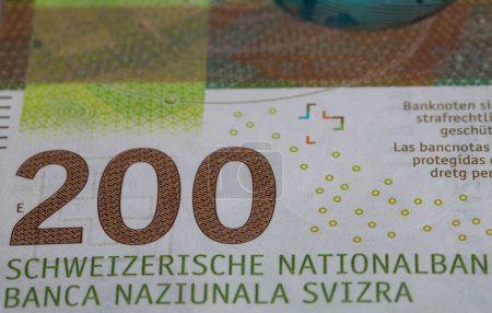 Primer plano del billete de 200 francos suizos con fines de diseño
