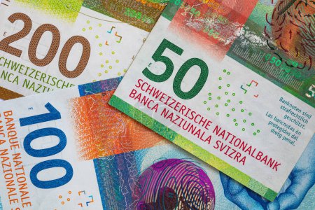 Closeup of 50, 100 and 200 Swiss franc banknotes for design purpose
