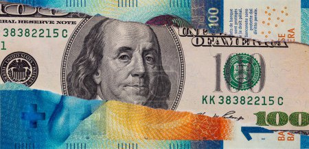 Billet de 100 francs suisses déchiré Billet de 100 francs suisses déchiré à des fins de conception