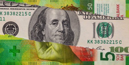 100 US dollar banknote through torn 100 Swiss franc banknote for design purpose