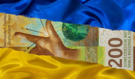 Billet de 200 francs suisses et drapeau national ukrainien à des fins de conception