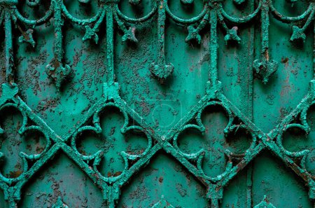 Photo for Ancient green  rusty forged fence decoration,  vintage decoration for design purpose - Royalty Free Image
