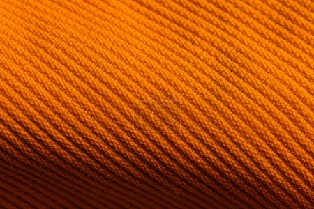 Photo for Closeup of orange corduroy cloth as patterned textured background for design purpose - Royalty Free Image