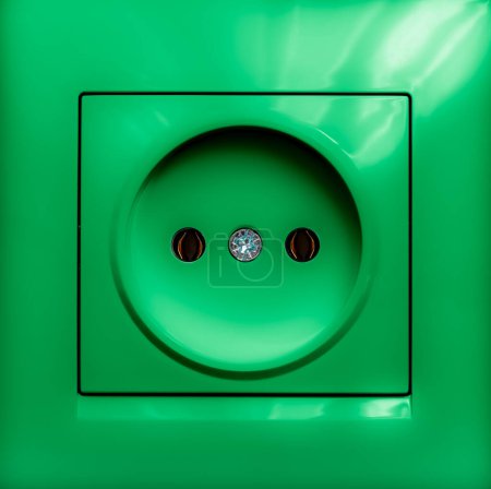Nahaufnahme der grünen Steckdose für Designzwecke