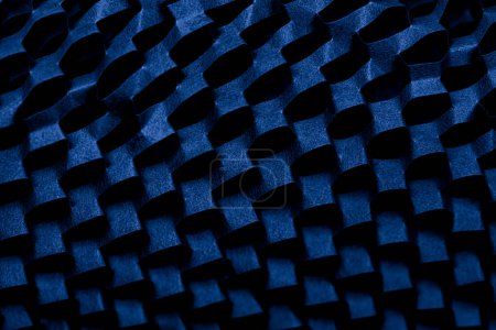 Gros plan de papier d'emballage de coussin en nid d'abeille bleu-violet comme fond texturé à motifs à des fins de conception