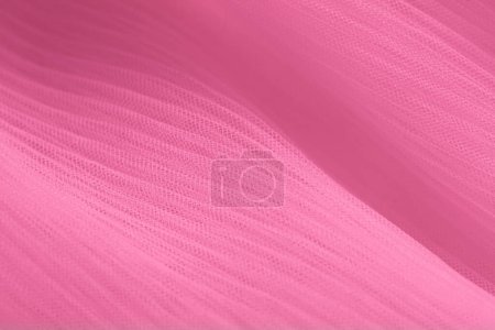 closeup of pink corrugated organza textured background for design purpose