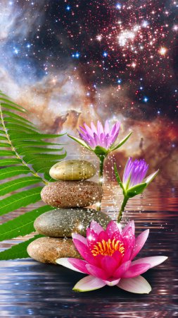 Photo for Flower of the sacred lotus as a symbol in Asian art and religion. Against the background of the starry sky - Royalty Free Image