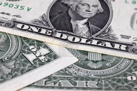 Foto de Image of one dollar bills lying in disarray - Imagen libre de derechos