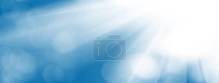 Téléchargez les photos : Image abstraite d'un fond bleu avec des faisceaux de lumière dirigés et bokeh - en image libre de droit