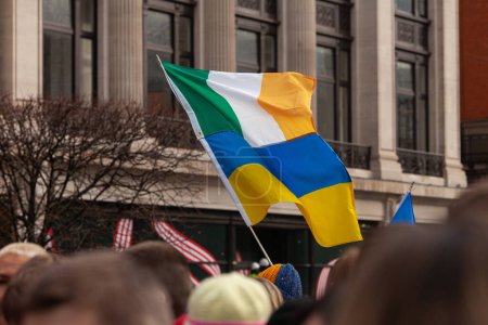 Photo for Dublin, Co. Dublin, Ireland - February 24th 2023 - Ukrainians and supporters rally. The first anniversary of Russia's invasion of Ukraine. O'Connell street near GPO. Irish and Ukrainian flags - Royalty Free Image