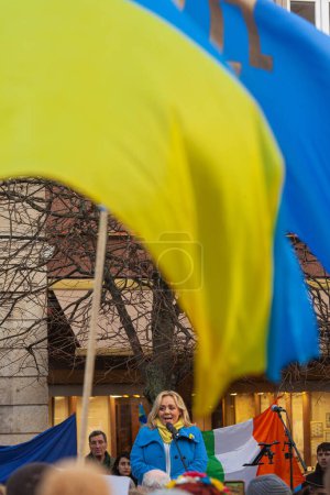 Photo for Dublin, Co. Dublin, Ireland - February 24th 2023 - Ukrainians and supporters rally. The first anniversary of Russia's invasion of Ukraine. O'Connell street near GPO. Speech of Mary Seery-Kearney, senator Fine Gael - Royalty Free Image