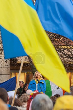 Photo for Dublin, Co. Dublin, Ireland - February 24th 2023 - Ukrainians and supporters rally. The first anniversary of Russia's invasion of Ukraine. O'Connell street near GPO. Speech of Mary Seery-Kearney, senator Fine Gael - Royalty Free Image