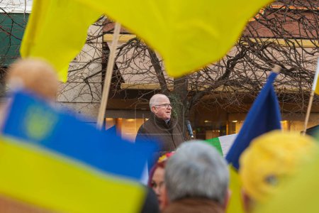 Photo for Dublin, Co. Dublin, Ireland - February 24th 2023 - Ukrainians and supporters rally. The first anniversary of Russia's invasion of Ukraine. O'Connell street near GPO. Speech of Charles Flanagan, Committee of Defence - Royalty Free Image