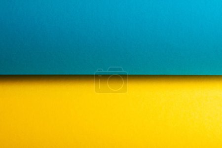 Photo for Rolls of splash paper for creativity. Two colours - light blue, lemon yellow. National flag of Ukraine. Text space. Close up. Studio shot - Royalty Free Image