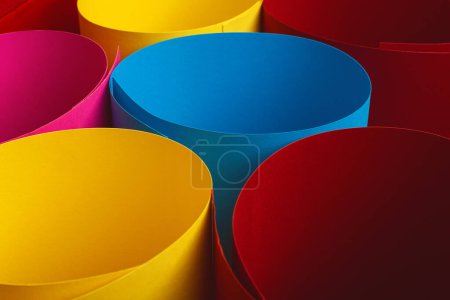 Photo for Rolls of splash paper for creativity. Four colours - light blue, lemon yellow, deep red. and pink. Text space. Close up. Studio shot - Royalty Free Image