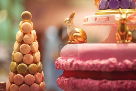 Photo for Pyramid, cone made of french macarons. Window of sweet shop. Indoor shot - Royalty Free Image