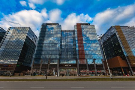 Foto de Gdansk, Poland - April 2022: Alchemia square with few modern big corporate buildings - Imagen libre de derechos