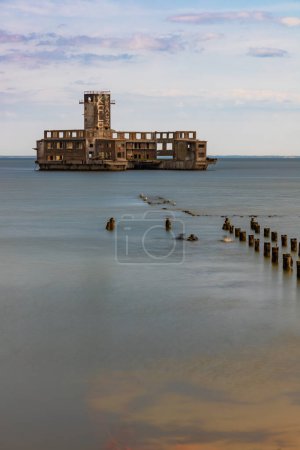 Photo for Gdynia, Poland - July 24 2023: Babie Doly beach with old ruins of pier and ruins of torpedo room on the Baltic sea - Royalty Free Image