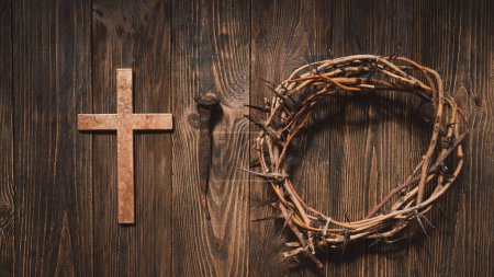 Photo for Jesus Crown Thorns and nails and cross on a wood background. Crucifixion Of Jesus Christ. Passion Of Jesus Christ. Concept for faith, spirituality and religion. Easter Day - Royalty Free Image