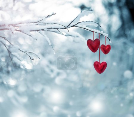 Photo for Red hearts on snowy tree branch in winter. Holidays. Happy valentines day celebration. Heart love concept. - Royalty Free Image