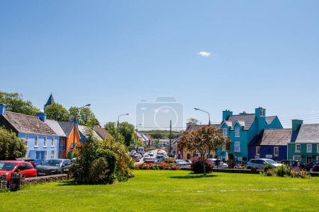 Photo for EYERIES, IRELAND - JULY 14, 2019: Colorful houses in Eyeries, small town on Ring of Kerry, famous Atlantic way in Ireland - Royalty Free Image