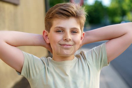 Photo for Portrait of handsome preteen school kid boy. Beautiful happy child looking at the camera. Schoolboy smiling. Education concept. Teenager outdoors. - Royalty Free Image