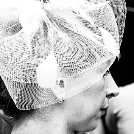 Photo for Epsom Surrey, London UK, June 04 2022, Close Up Of Woman Wearing Fashionable Hat Or Fascinator Epsom Derby - Royalty Free Image