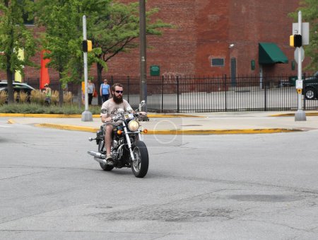 Photo for INDIANAPOLIS,IN-SEPTEMBER 02:Unidentified Biker with Long Beard enjoying Motorcycle Ride at Mass Ave. September 02,2014 in Indianapolis, IN, USA - Royalty Free Image