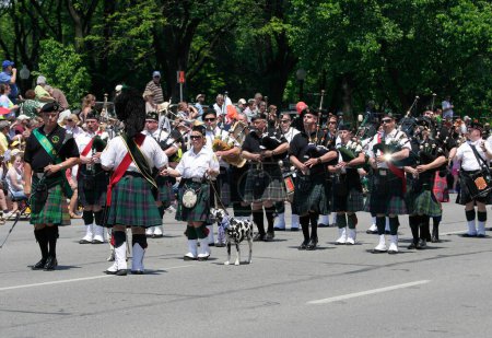 Photo for Indianapolis, IN, USA-May 23,2009:Unidentified Marching Band with Kilts and Bagpipes at Indy 500 Parade - Royalty Free Image