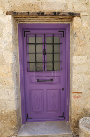 Abandoned Old Greek House with Purple Wooden  Door in Alacati, Izmir, Turkey