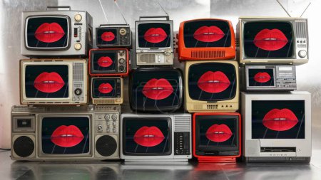 Photo for Amazing collection of vintage and retro televisions made into a tv wall lips on the screen - Royalty Free Image