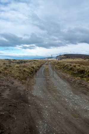 Photo for Dirt roads which ends in rural house, cabo san pablo, tierra del fuego, argentina - Royalty Free Image