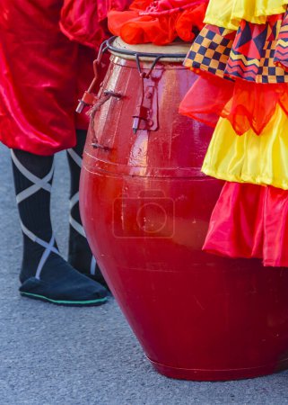 Legs of candome comparsa people and famous piano drum, calls parade, montevideo, uruguay.