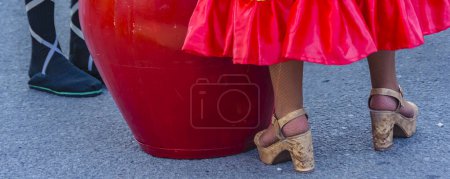 Legs of candome comparsa people and famous piano drum, calls parade, montevideo, uruguay.